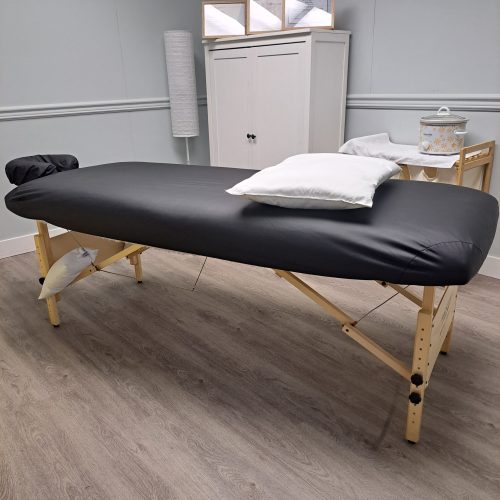 A look at the office for Holly LeRoy Massage Therapy showing a massage table